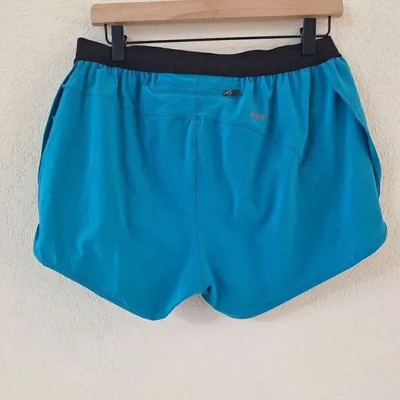 Saucony outpace 2.5" split short turquoise medium - Picture 8 of 8